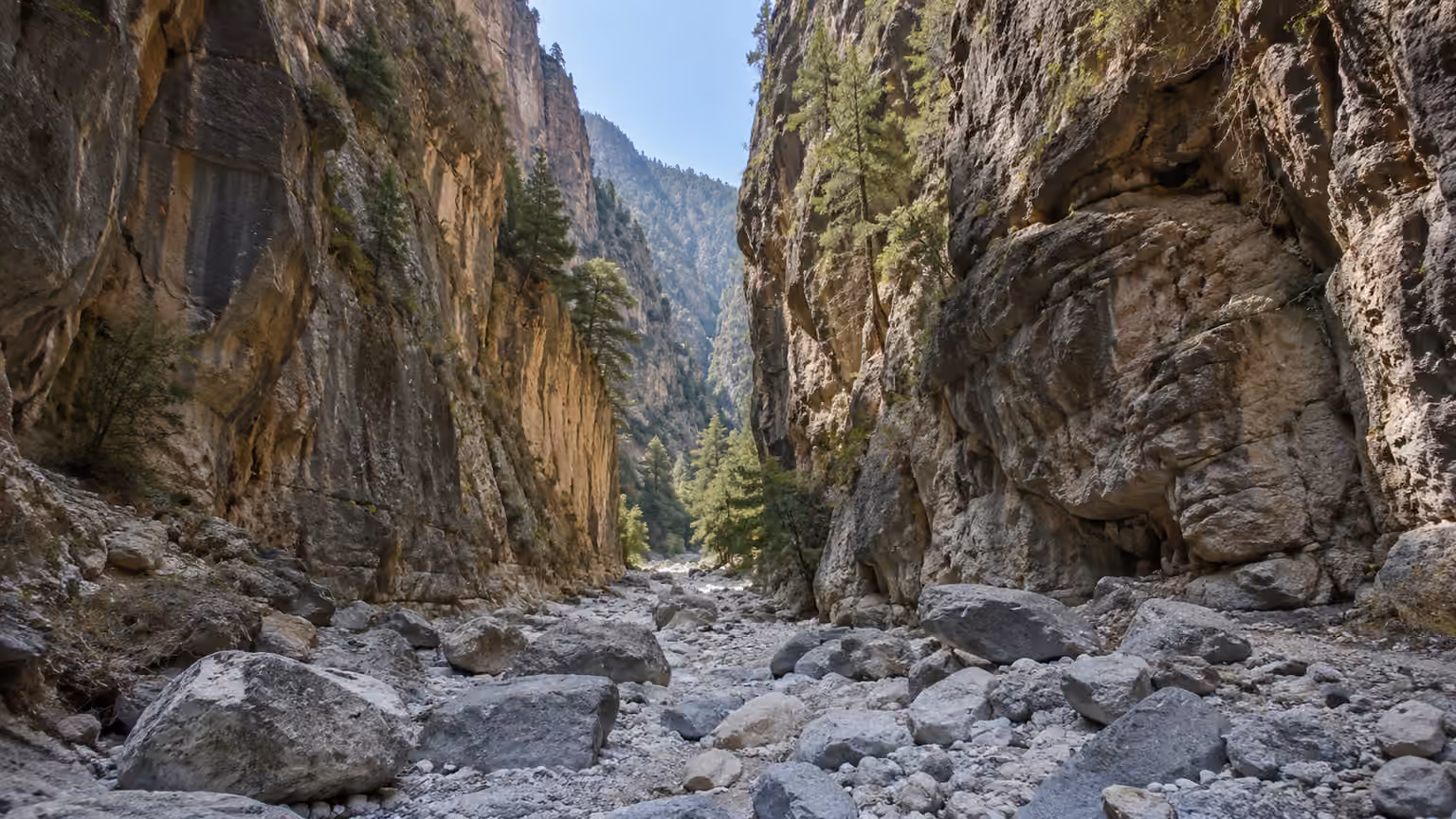 Samaria Gorge Crete Greece with its narrow natural limestone walls and a rocky dry streambed