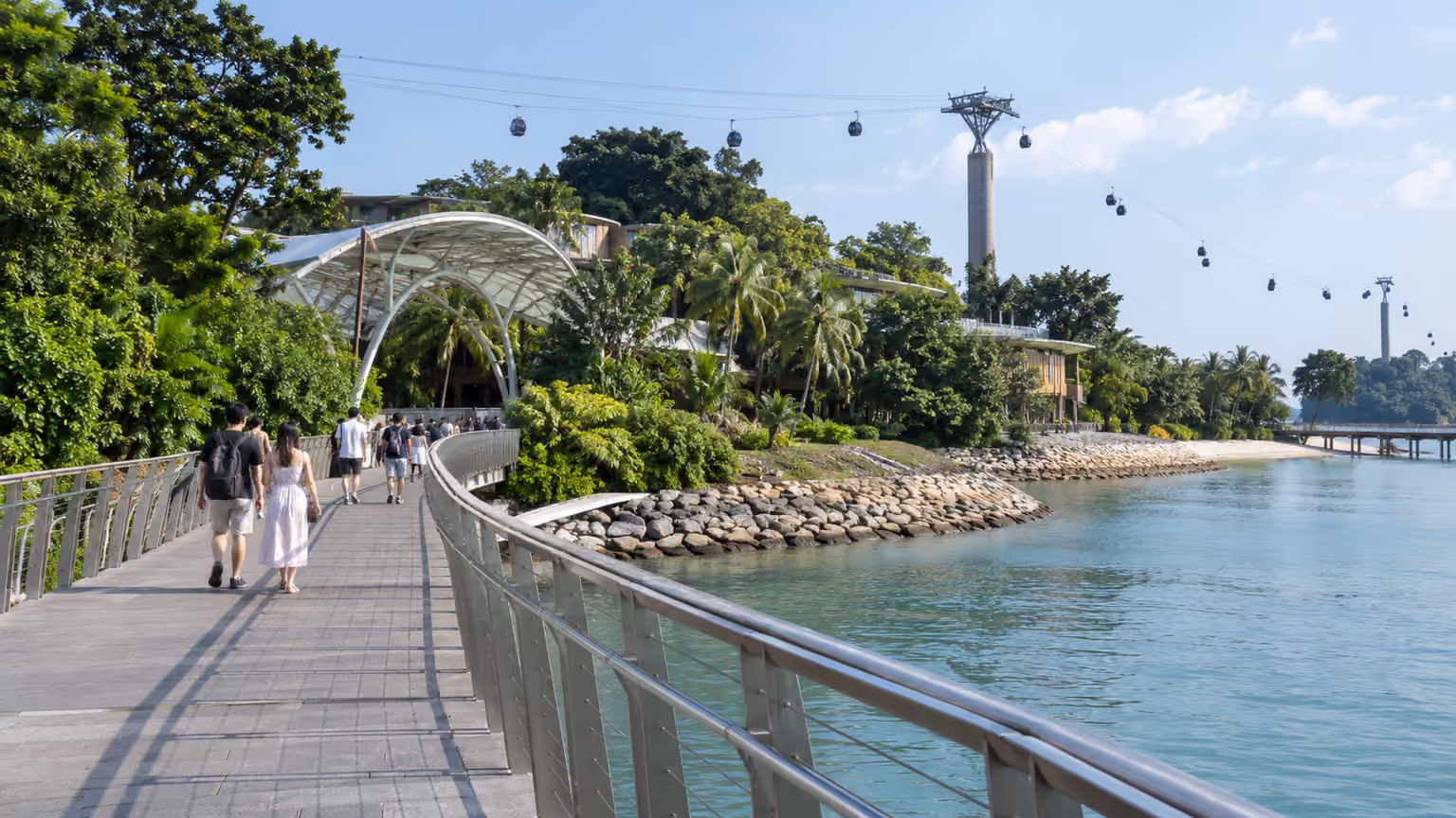 The Sentosa Boardwalk and its waterfront pedestrian route toward the island