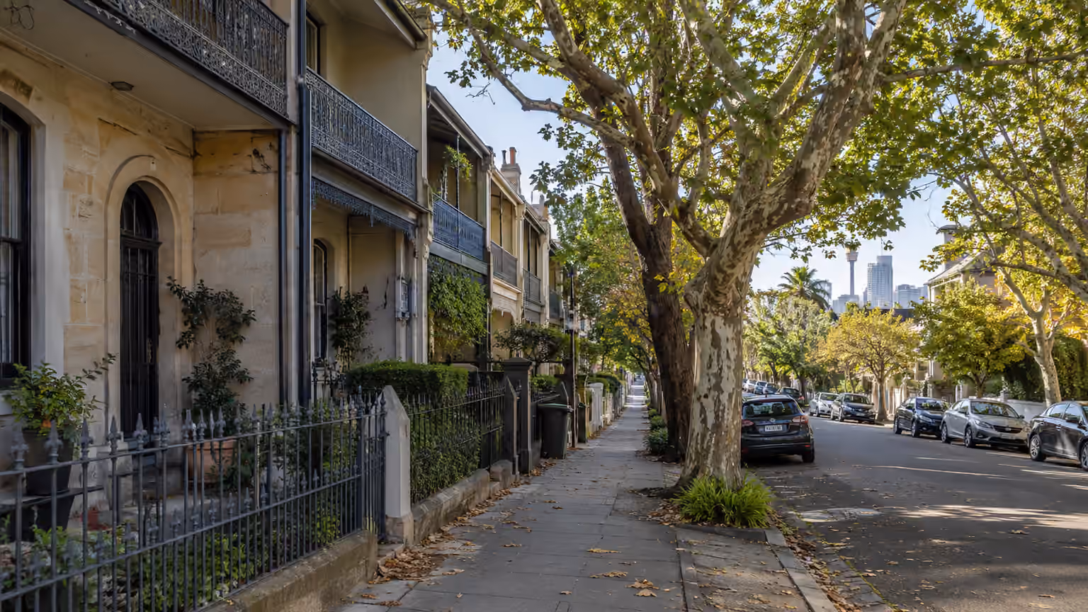 A Sydney neighbourhood street with sandstone terraces and leafy trees in the inner-city area