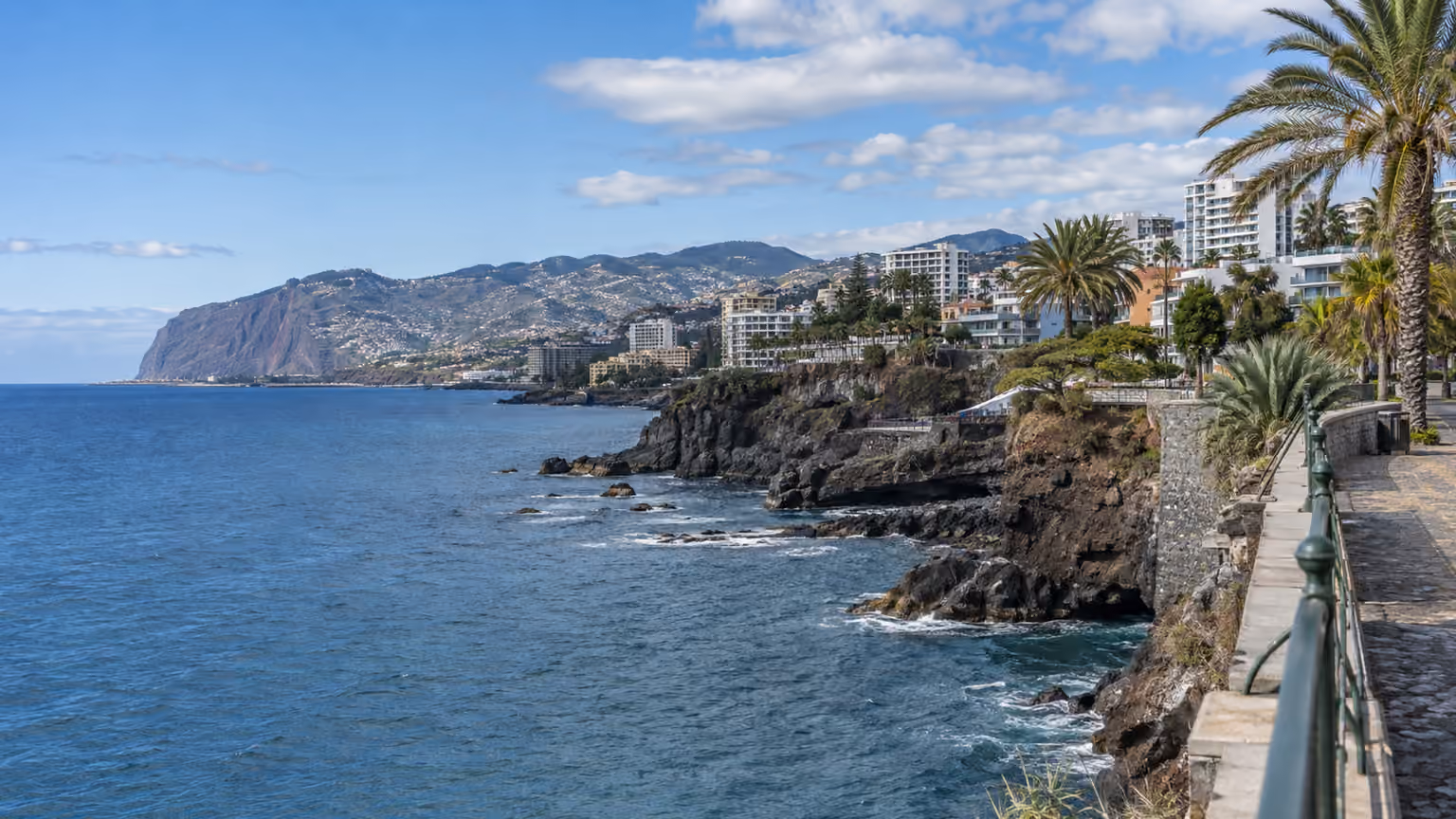 Funchal’s coastal hotel district and seaside promenade on Madeira