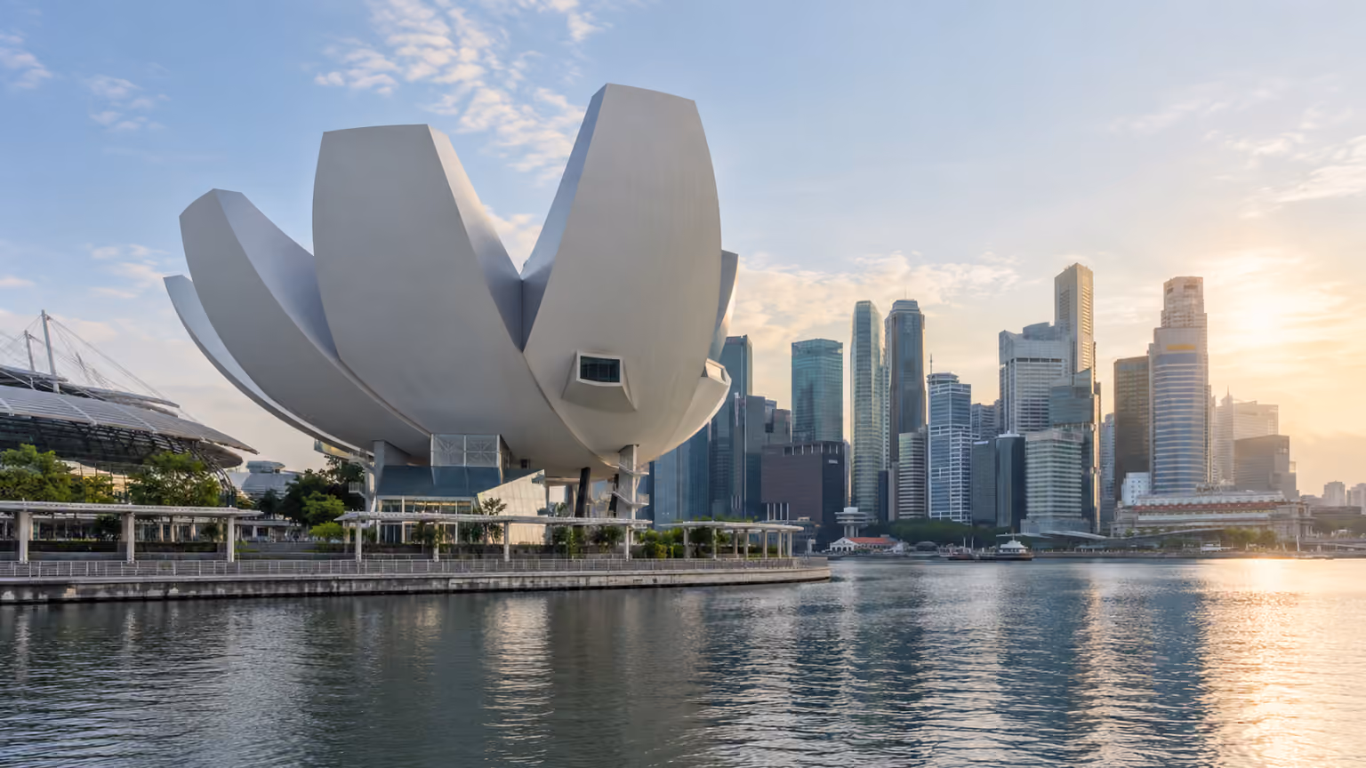White lotus-shaped ArtScience Museum beside the Marina Bay waterfront in Singapore